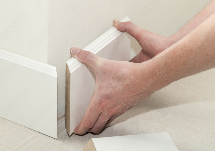 Person installing Trim